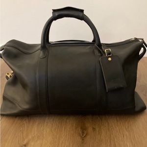 Coach black duffle carry on bag